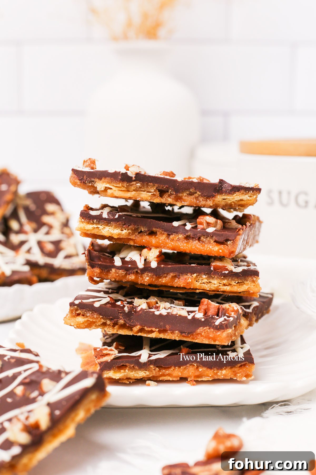 4-Ingredient Christmas Crack Recipe for Holiday Treats 3 close up of chocolate toffee on crackers