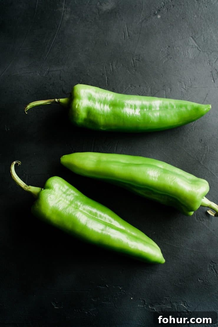 Mexican Chiles: Fresh and Dried Pepper Varieties 4 Fresh Anaheim chile pepper with light green skin, a mild Mexican chile often roasted for chile rellenos, soups, and green chile dishes.