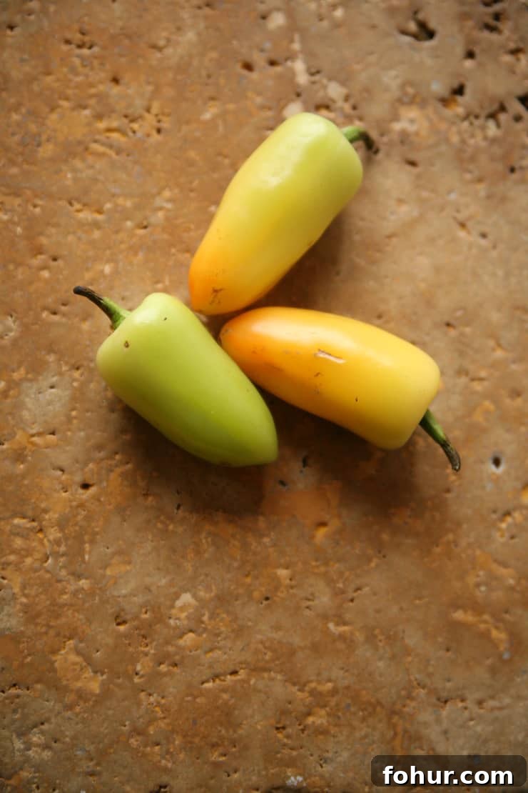 Mexican Chiles: Fresh and Dried Pepper Varieties 8 Fresh yellow chile güero pepper, a mildly spicy Mexican chile often roasted, pickled, or used in salsa.