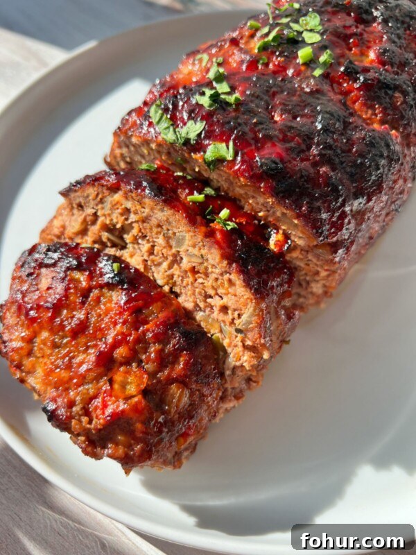 Sliced air fryer meatloaf with glaze