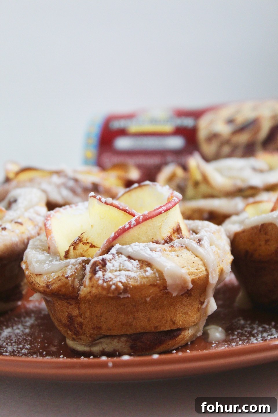 Apple roses made from cinnamon rolls and thin apple slices