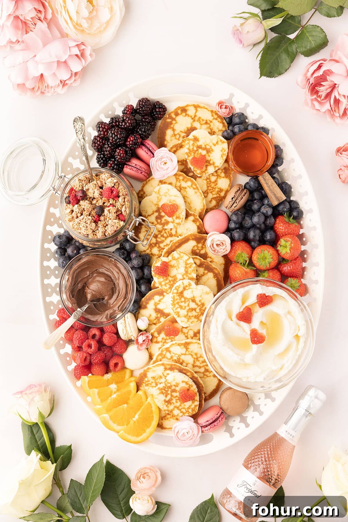 Valentine's Day Charcuterie Board for Two 2 Breakfast charcuterie board with mini pancakes and berries.