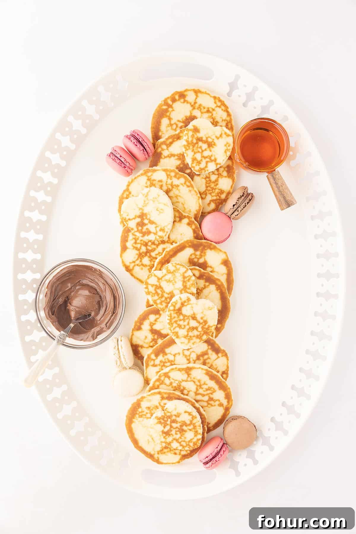 Valentine's Day Charcuterie Board for Two 6 Pancakes and macarons on a plate.