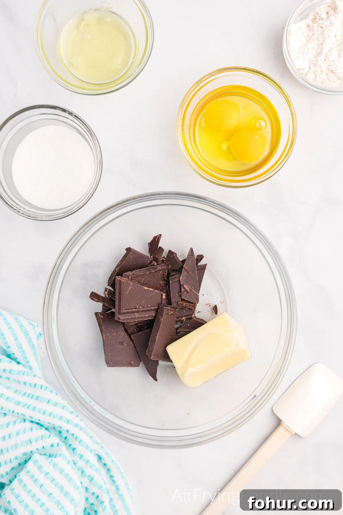 Butter and chocolate in a bowl ready to be melted together.