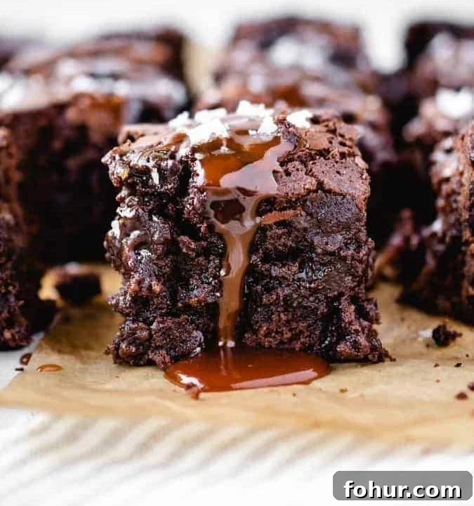Close up image of salted caramel brownies with caramel drip