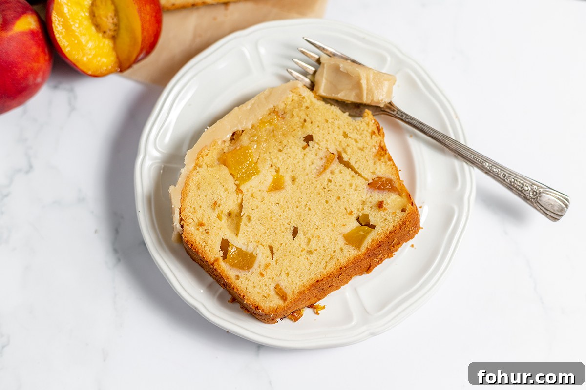 Moist Homemade Peach Bread Recipe with Cinnamon Glaze 3 Slice of Peach Bread on white plate.