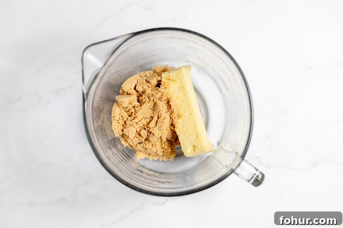 Moist Homemade Peach Bread Recipe with Cinnamon Glaze 7 Butter and brown sugar in glass bowl.