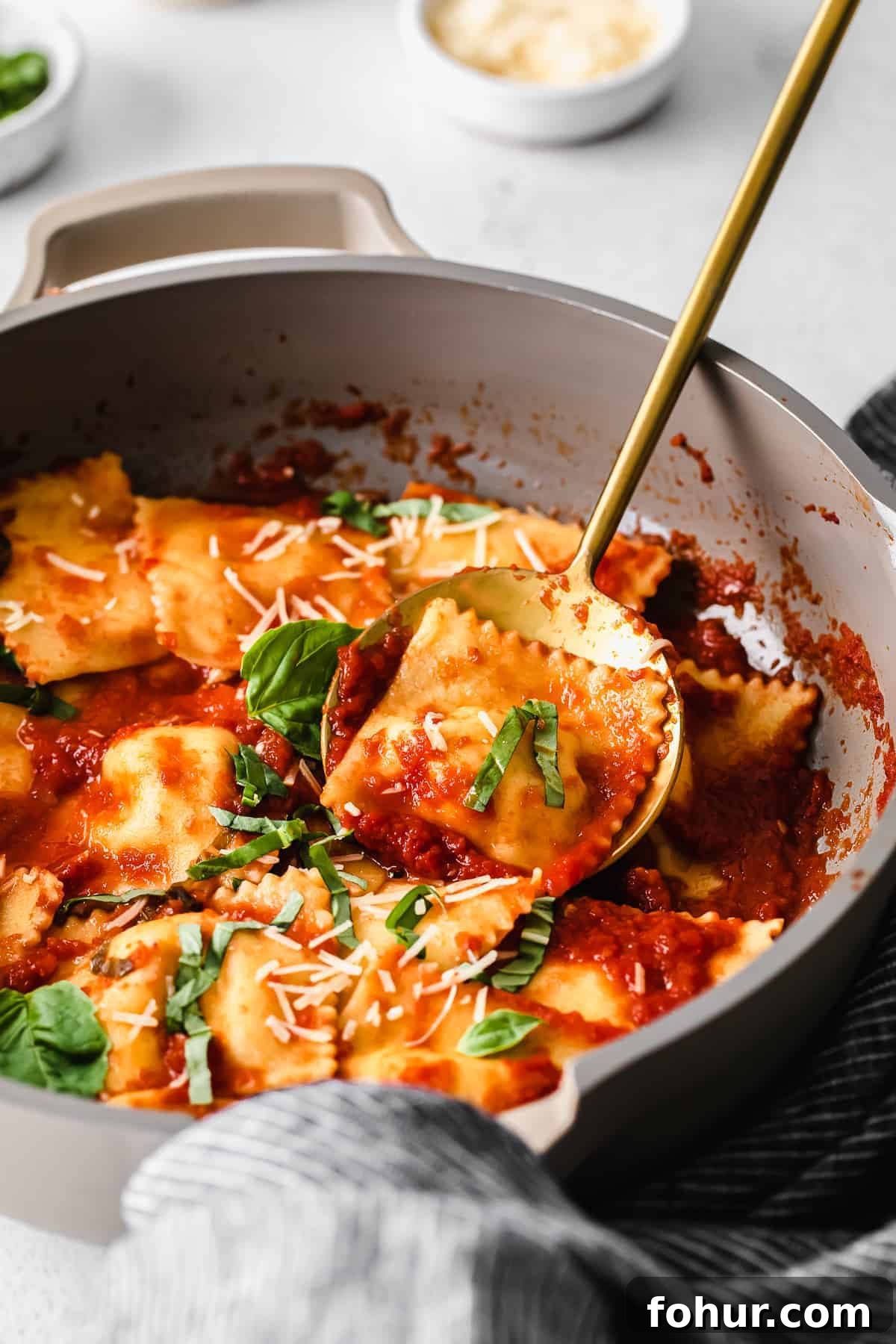 Serving homemade cheese ravioli homemade cheese ravioli in a skillet