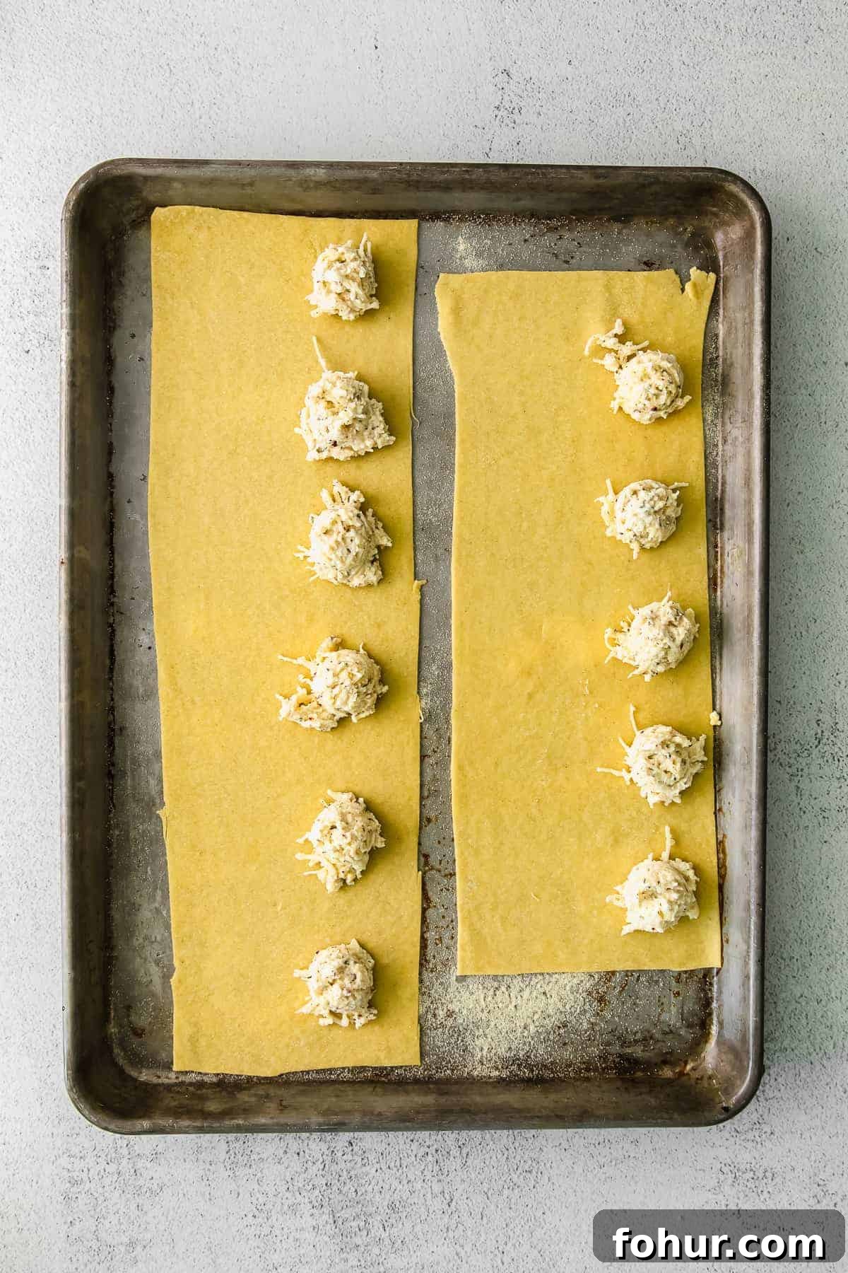 Assembled homemade cheese ravioli homemade cheese ravioli assembled on a baking sheet