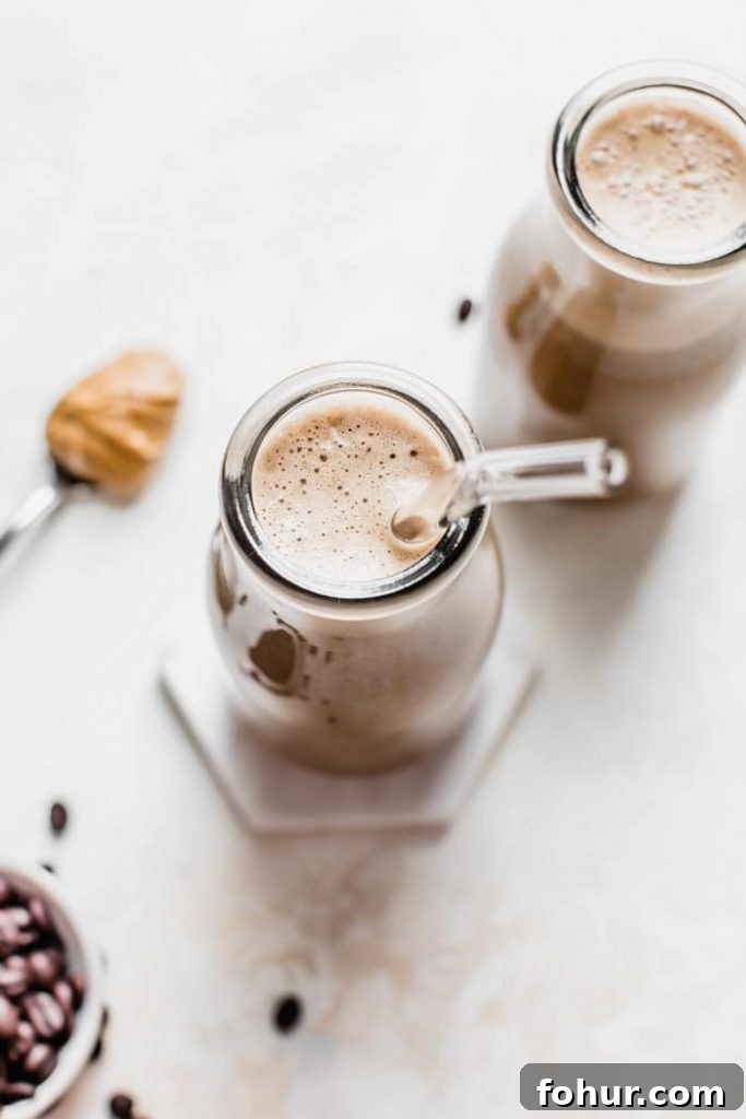 10 Coffee Smoothie Recipes to Energize Your Morning 4 Cold Brew Protein Smoothie made with cold brew coffee, nut butter and protein powder | thealmondeater.com