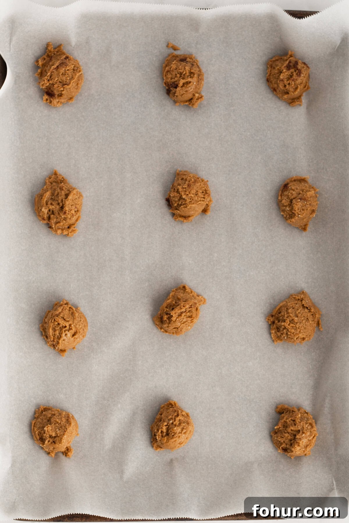 3-Ingredient Spice Cake Mix Cookies Recipe 8 cookie dough on a parchment lined baking tray