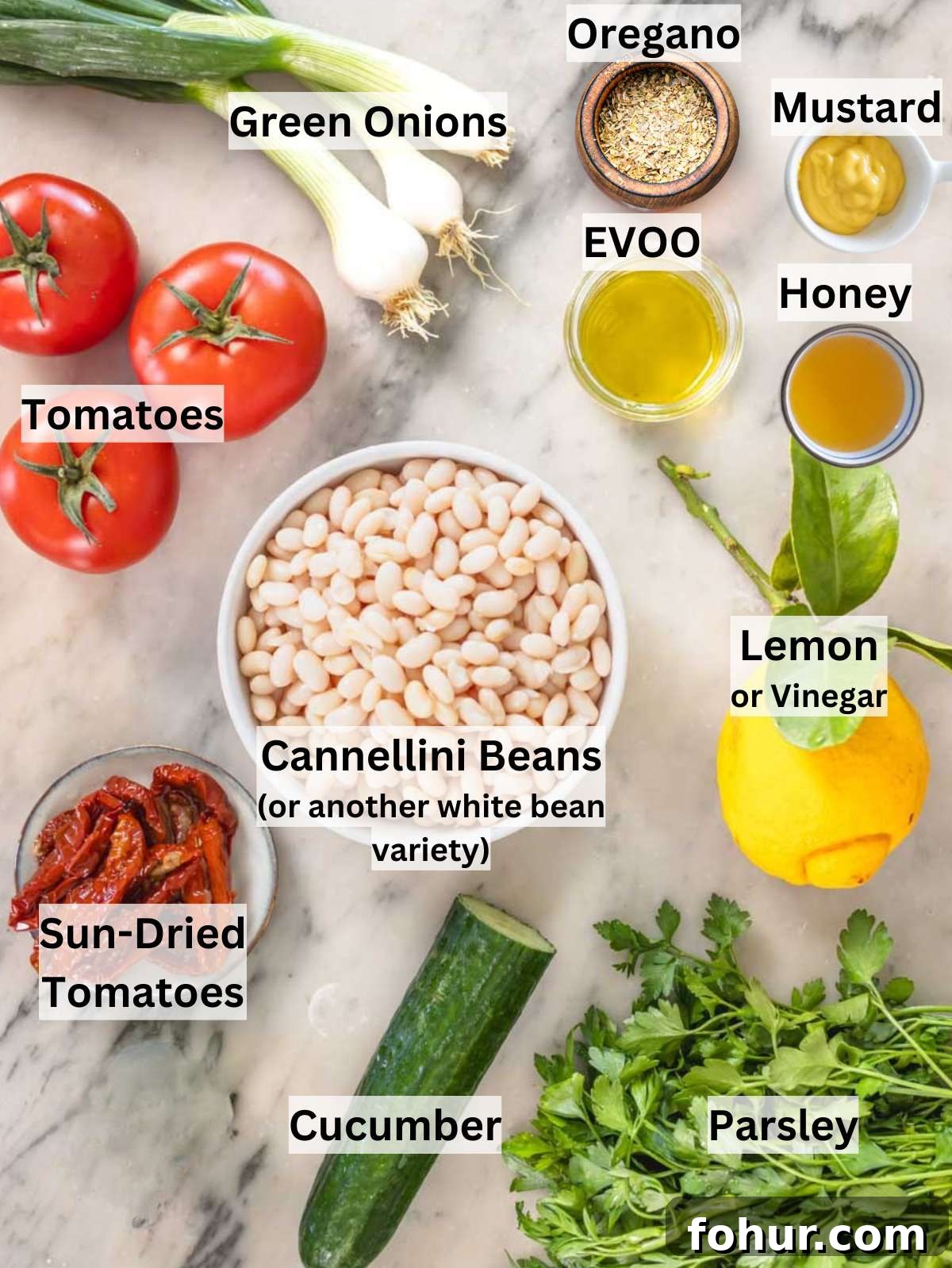 Hearty Mediterranean White Bean Salad with Herbs and Lemon 3 Ingredients for dense white bean salad arranged on a wooden board ready to mix.
