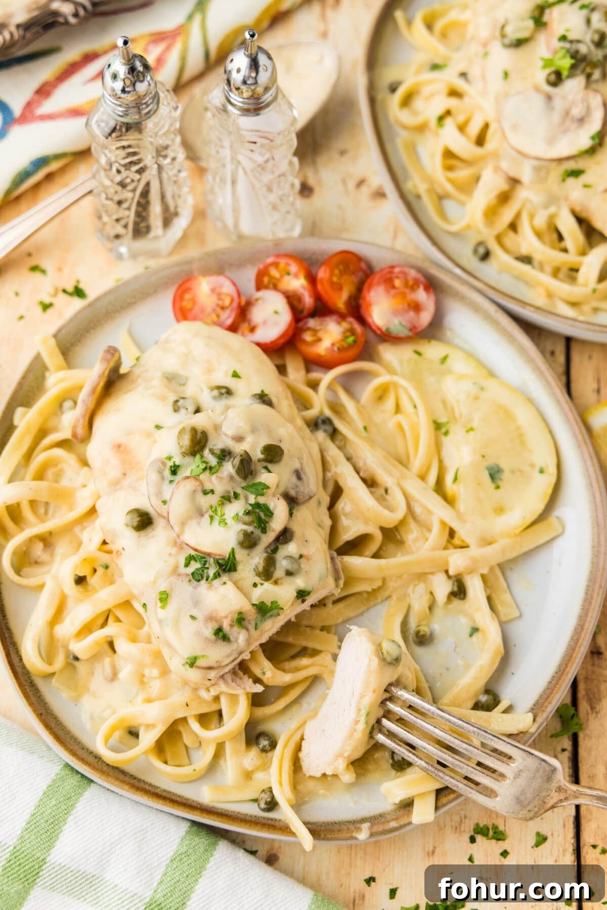Crispy Chicken Scallopini with Lemon Butter Sauce 12 Chicken Scallopini on fettucini on plate
