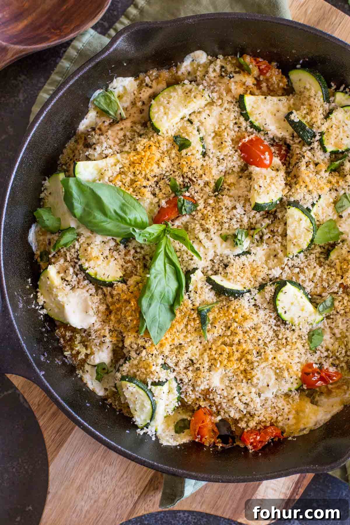How to Clean a Cast Iron Skillet Without Stripping Seasoning 7 Pesto Chicken Skillet garnished with some fresh basil.