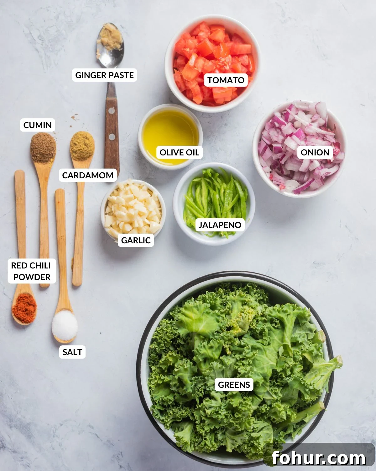 Gomen Wat: Spicy Ethiopian Collard Greens Recipe 3 Overhead view of ingredients to make Gomen Wat, labeled.