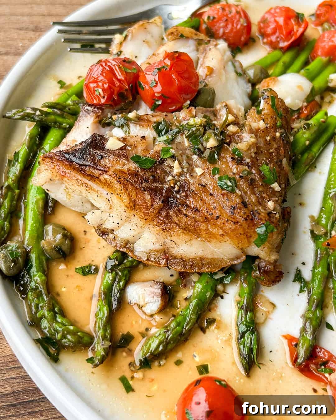 Mediterranean Grouper Recipe with Blistered Tomatoes 4 Plated Mediterranean grouper with tomatoes