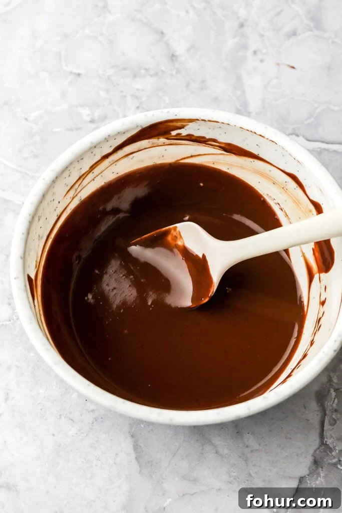 Decadent Chocolate Ganache Cake Recipe 7 Chocolate ganache melted for drip topping