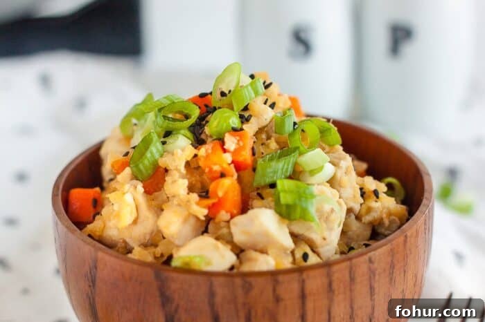 Crispy Keto Roasted Cauliflower with Parmesan 11 keto chicken fried rice recipe in bowl topped with salt and pepper