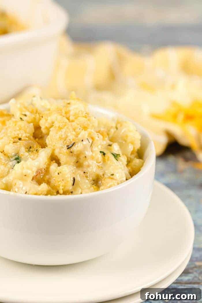 Crispy Keto Roasted Cauliflower with Parmesan 5 white bowl containing a serving of keto mac and cheese