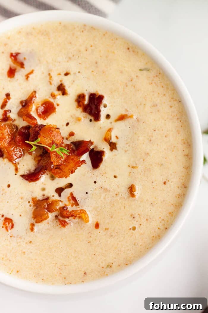 Crispy Keto Roasted Cauliflower with Parmesan 9 keto cauliflower soup served in bowl with bacon