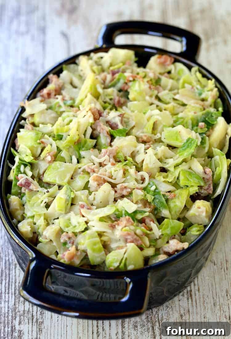 The Best Brussels Sprouts Casserole is a casserole recipe made with shaved brussel sprouts, bacon, cheese and cream