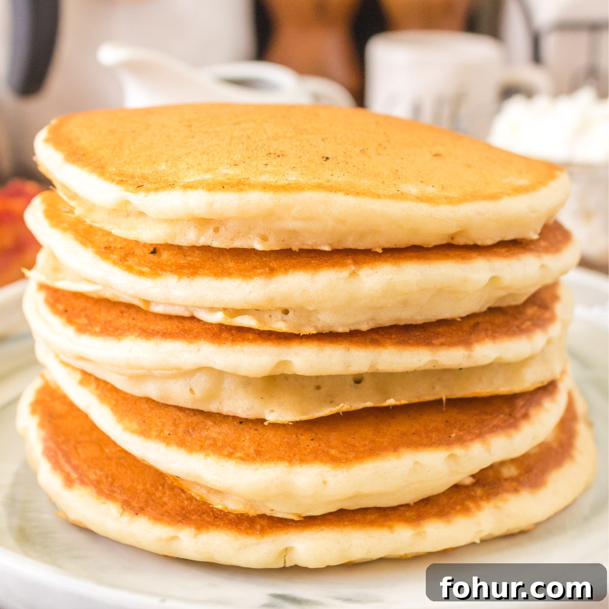Sideview of 5 soft discard pancakes stacked on top of each other. Hostess At Heart