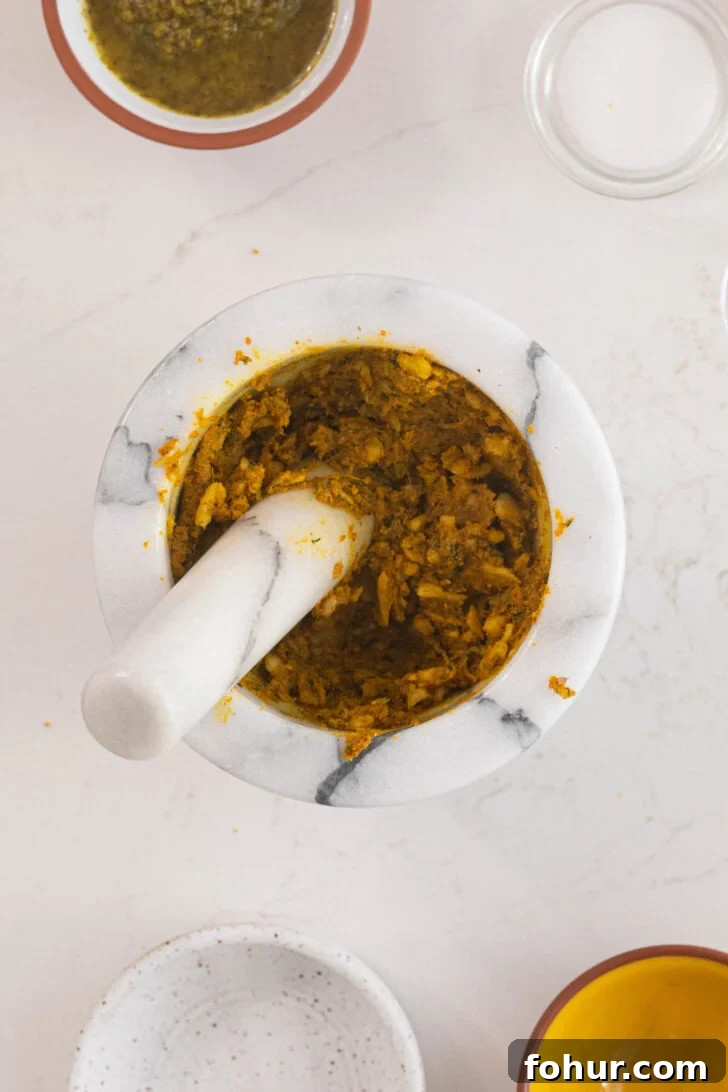 Crisp, Tender Puerto Rican Pernil: Roast Pork Shoulder 3 Marinade for pernil in a pilon.