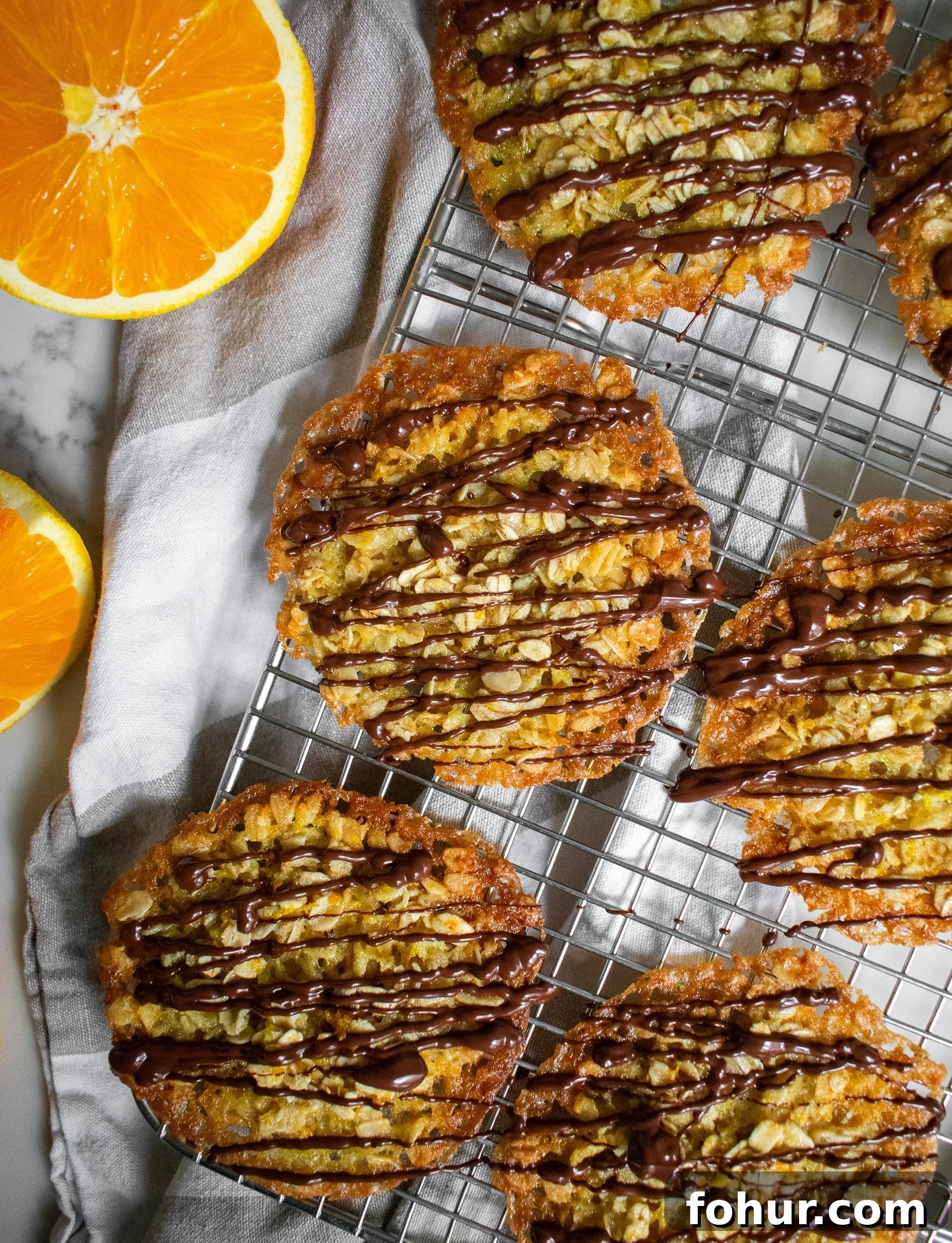 Homemade Oatmeal Cookies Recipe 4 Oat cookies with chocolate drizzle.