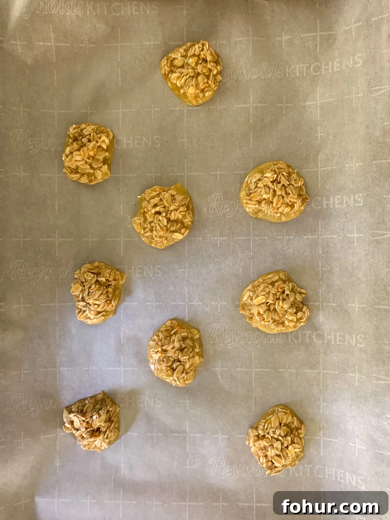 Homemade Oatmeal Cookies Recipe 6 Oat cookie mixture spooned onto a baking sheet lined with parchment paper