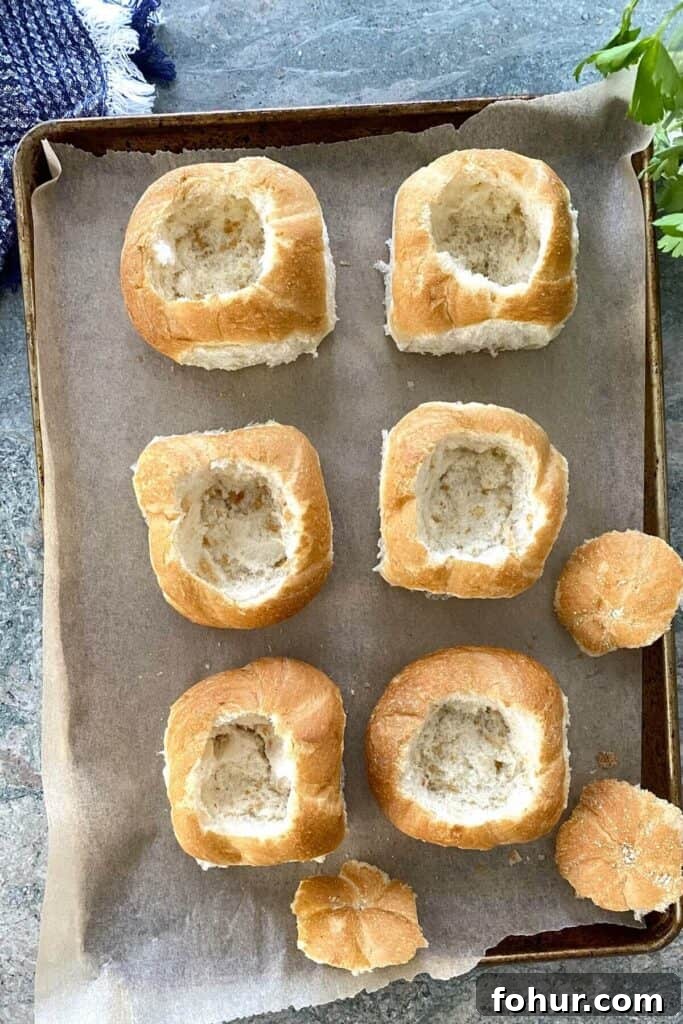 Baked Eggs in Mini Bread Rolls 5 hollowed out rolls for egg and ham sandwiches.