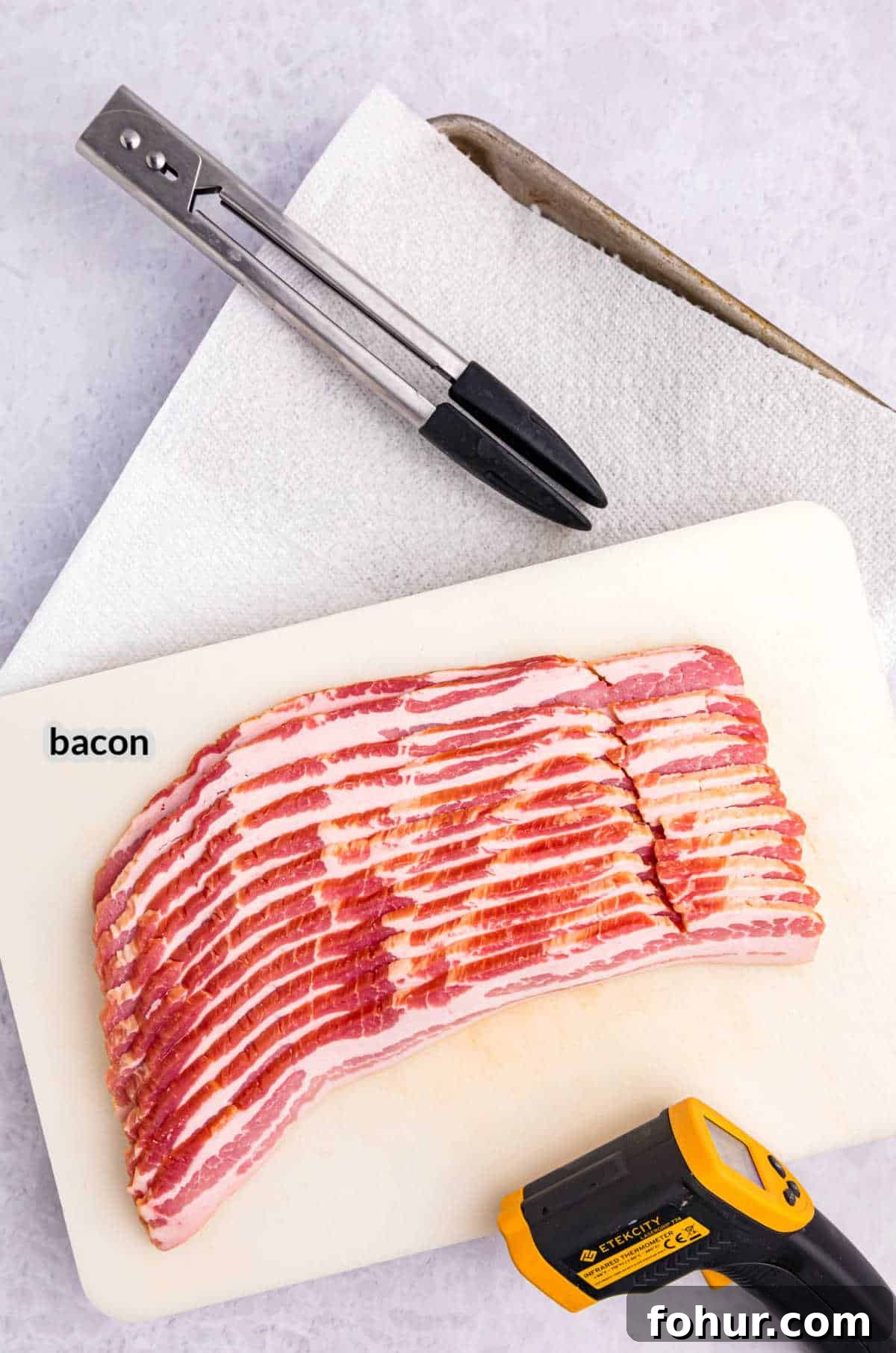 Crispy Bacon on a Blackstone Griddle: How to Cook It 3 Overhead Image of Blackstone Bacon Ingredients and Griddle Tools