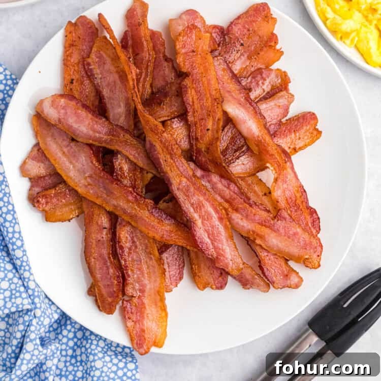 Crispy Bacon on a Blackstone Griddle: How to Cook It 6 Plate of cooked Blackstone bacon