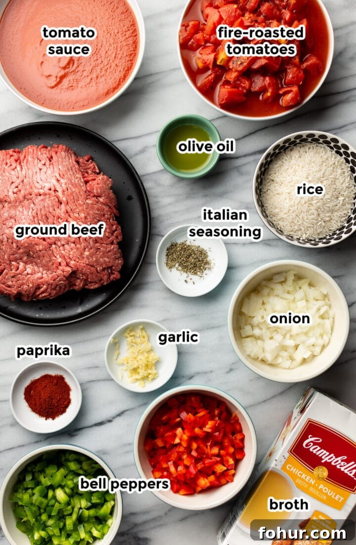 ingredients in small bowls on a marble surface for stuffed pepper soup