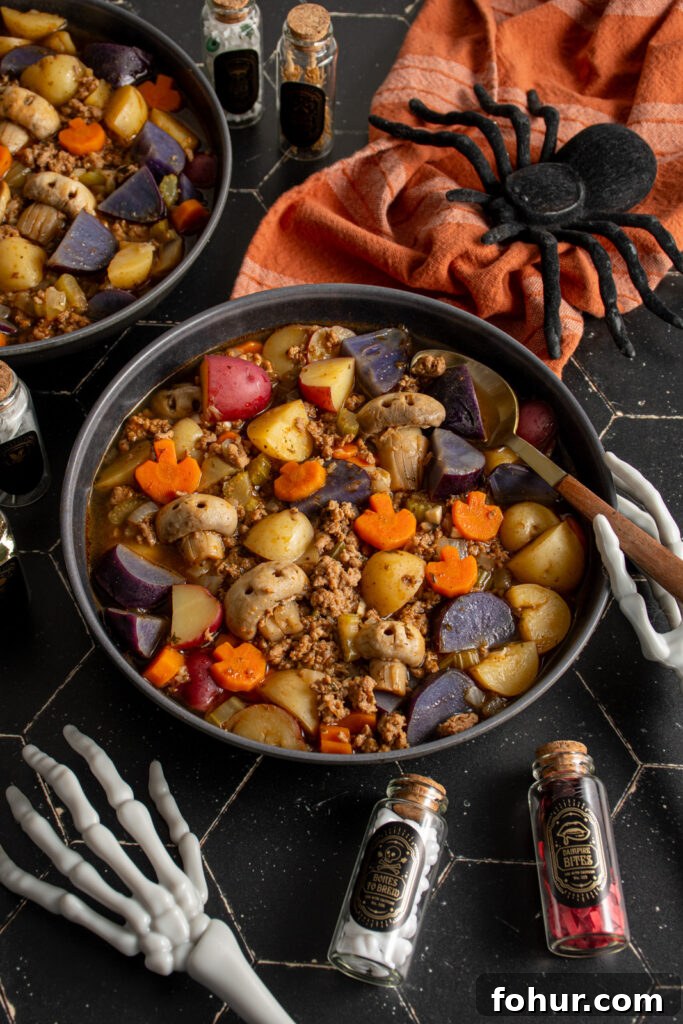 Witches' Brew Stew: Halloween Soup Recipe 4 Black bowls filled with Halloween soup featuring pumpkin-shaped carrots and mushroom skulls.