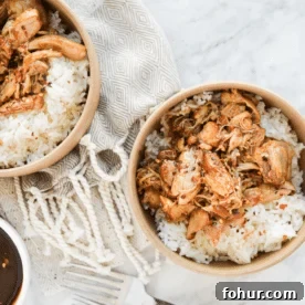 Instant Pot Salsa Chicken Recipe for Tacos and Meal Prep 8 a beige bowl filled with white rice and shredded instant pot bourbon chicken