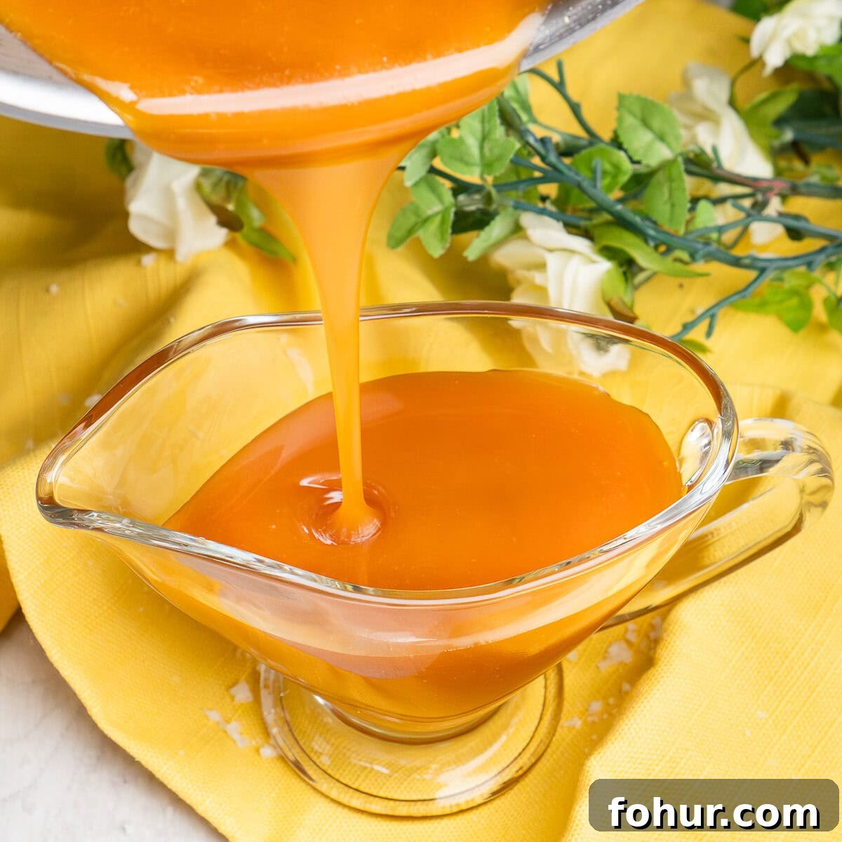 How to Make Salted Caramel Sauce 2 Pouring Salted Caramel Sauce into a glass jug