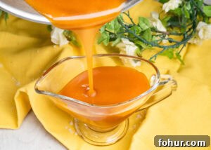 How to Make Salted Caramel Sauce 13 Pouring Salted Caramel Sauce into a small glass serving jug