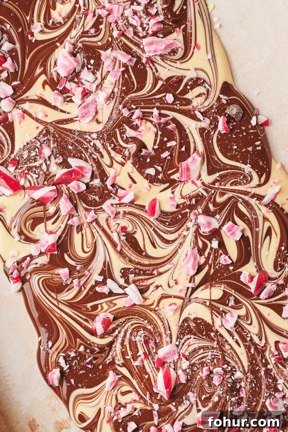 No-Bake Peppermint Bark Ready in 5 Minutes 3 Peppermint bark on parchment paper.