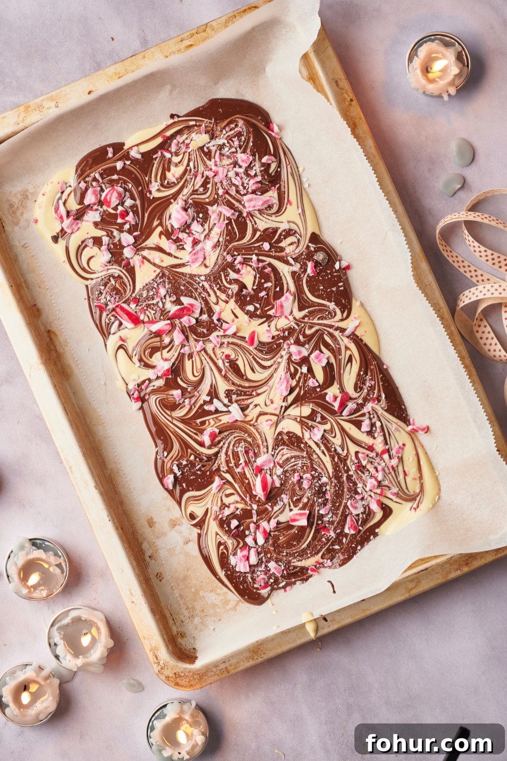 No-Bake Peppermint Bark Ready in 5 Minutes 9 Peppermint bark on parchment paper.