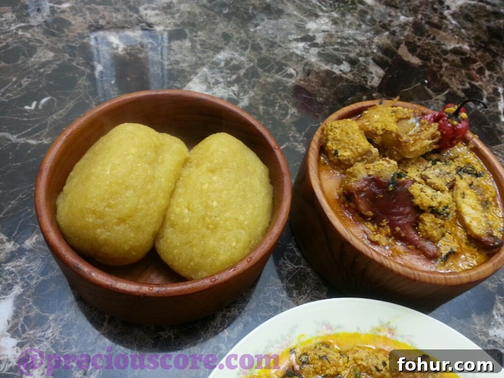 Ogbono and Egusi Soup Recipe: Classic Nigerian Soup 12 Ogbono and egusi soup served with garri