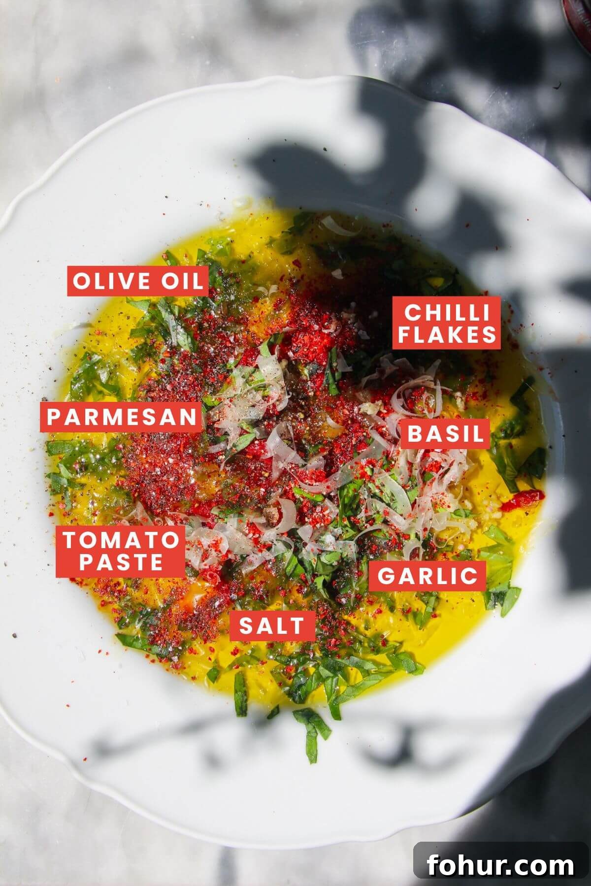 Pizza-Style Bread Dipping Oil with Garlic and Italian Herbs 4 Pizza bread dipping oil ingredients laid out and labelled.