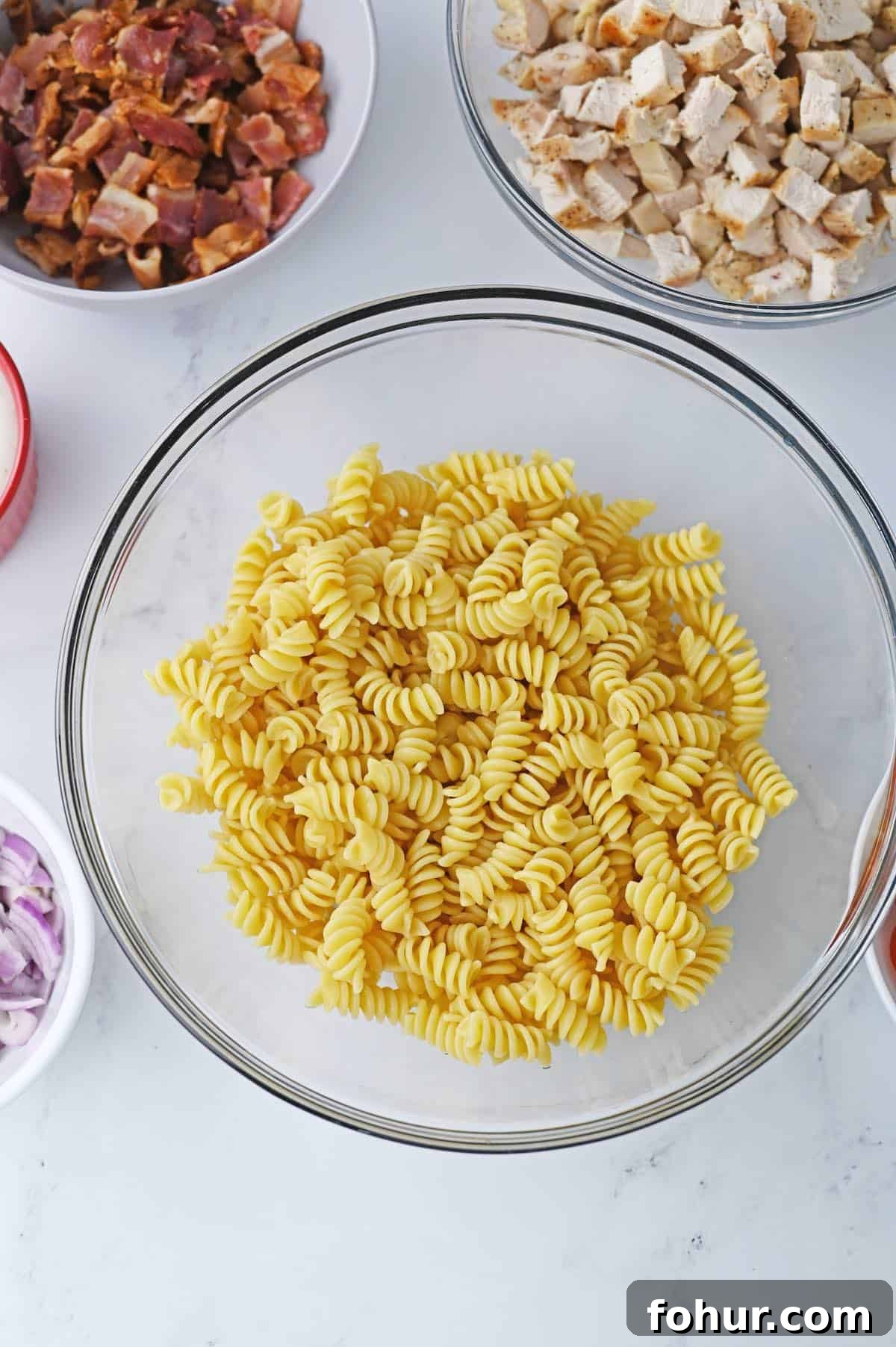 Cooked spiral pasta in a bowl.
