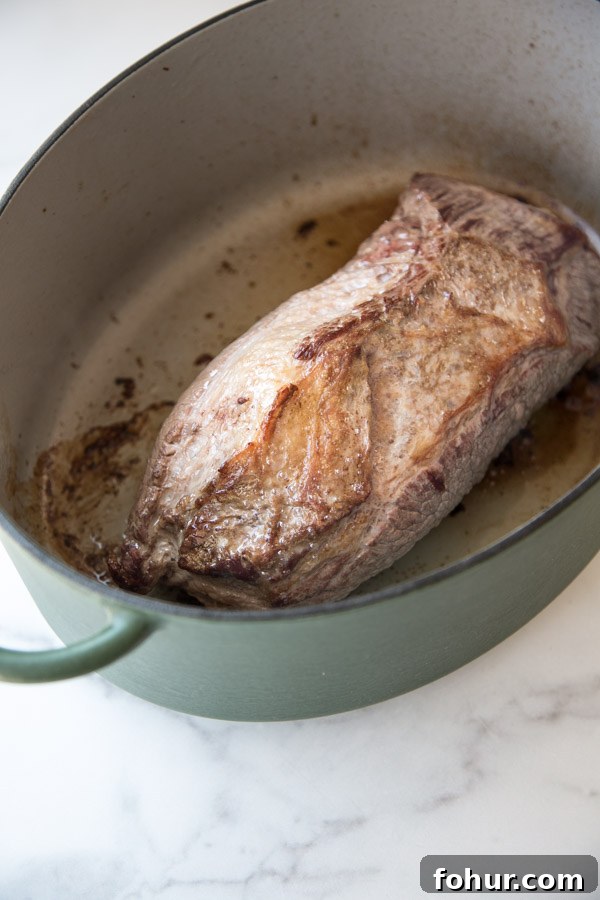 Passover Brisket Recipe for Any Jewish Holiday Dinner 3 seared brisket in a dutch oven