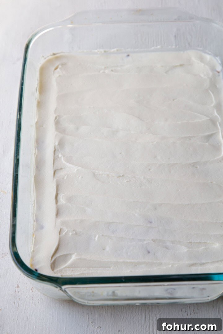 cream cheese mixture in a baking dish.