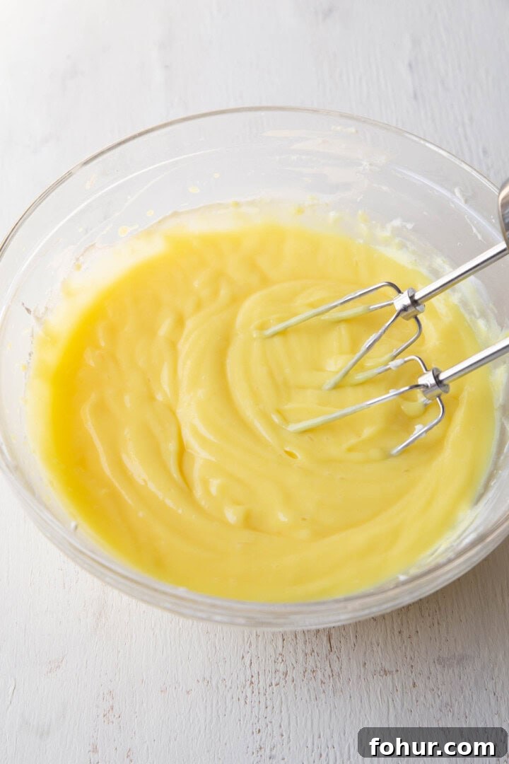 lemon pudding with a hand mixer.