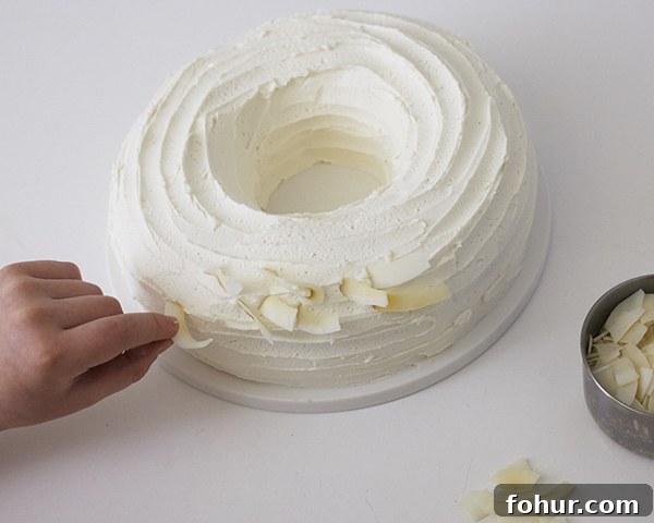 Chocolate Easter Nest Cake Recipe 12 Easter Nest Cake - how to make a nest cake with roasted coconut and chocolate eggs for Easter dessert | by Cakegirls for TheCakeBlog.com
