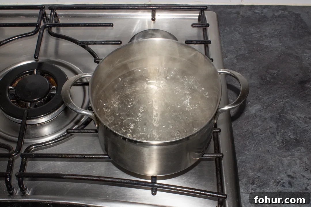 How to Cook Cauliflower: Roast, Steam, Saute and More 7 Cauliflower boiling in a pot on the hob