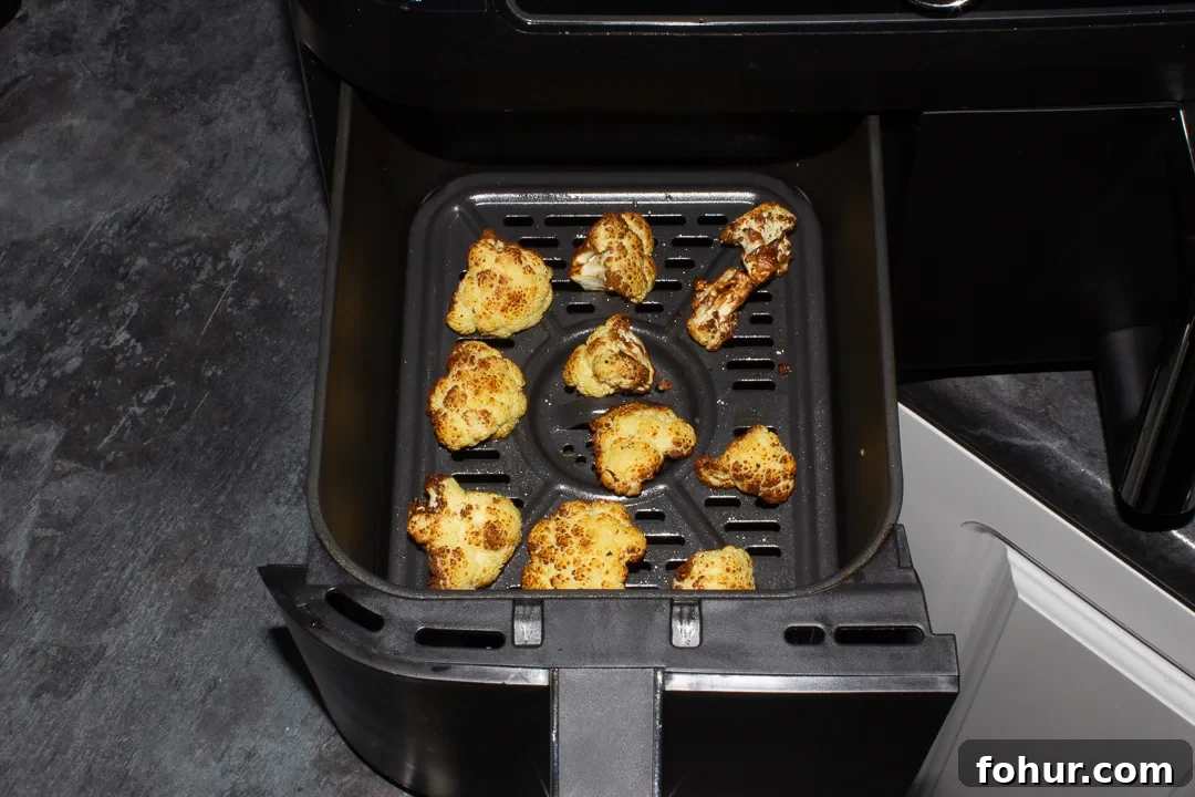 How to Cook Cauliflower: Roast, Steam, Saute and More 9 Air fried cauliflower in an air fryer drawer