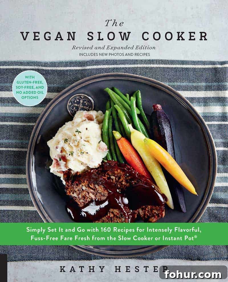 Kathy Hester's book front cover page of The Vegan Slow Cooker Revised and Expanded Edition with a healthy ceramic bowl of vegan recipe 