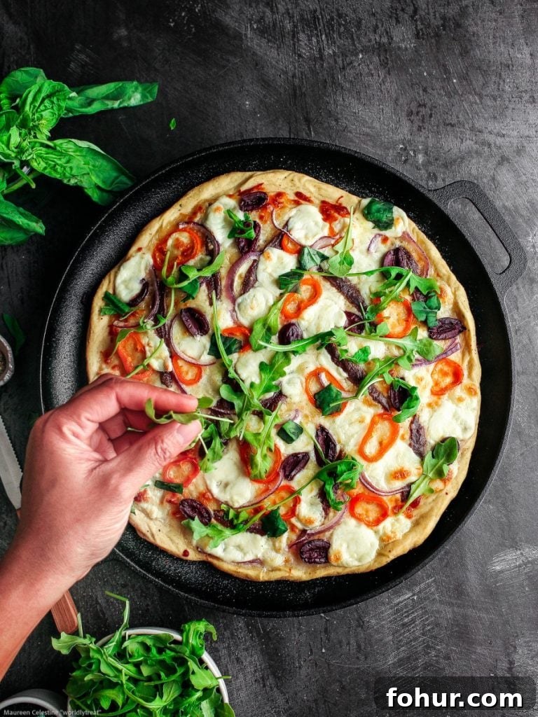 Authentic Anchovy Pizza Recipe with Garlic and Capers 2 a pan of anchovy pizza